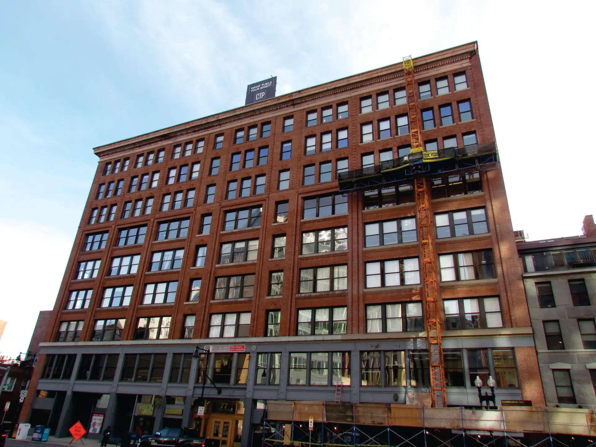 Suspended scaffold brick facade restoration at 77 North Washington, Boston